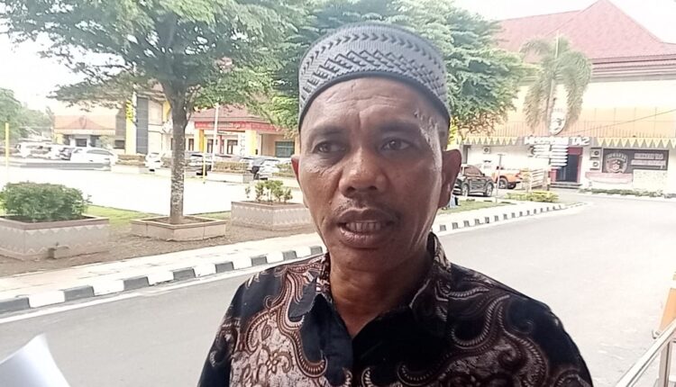 Orang tua AN usai membuat laporan Polisi.