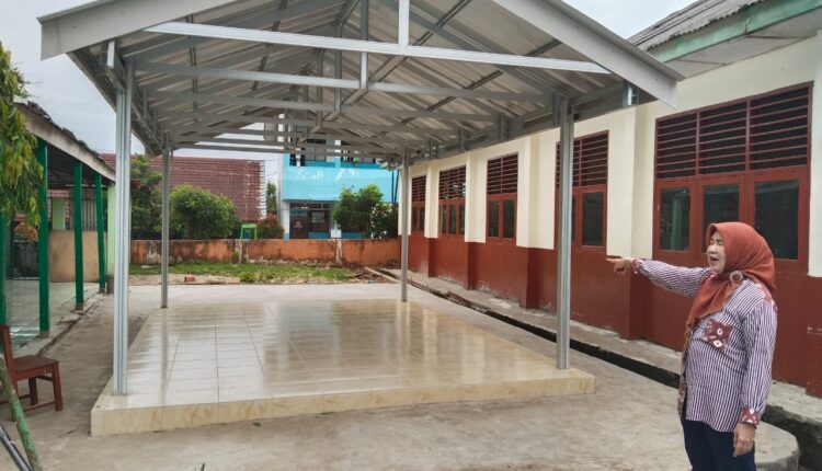 Ruang inspirasi terbuka SMP N 50 Palembang masih tahap pembangunan.