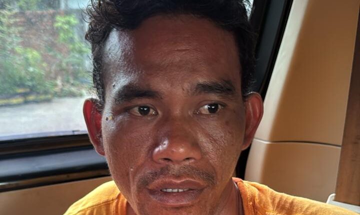 Pelaku saat diamankan Polisi.