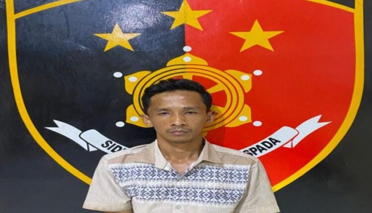 Tersangka Malik Ibrahim Putra (35) saat diamankan di Polres Mura.