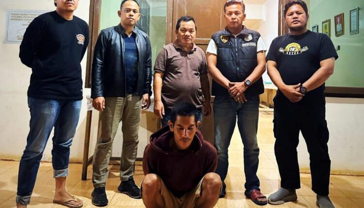Pelaku saat diamankan Polisi.