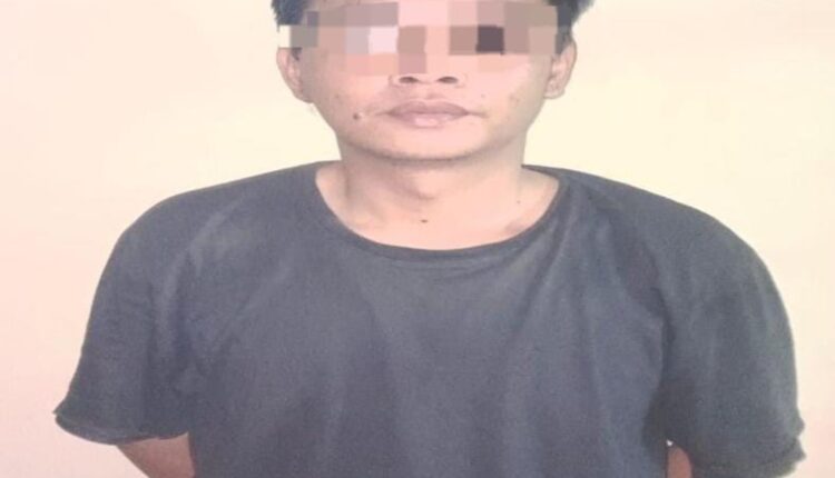 Tersangka saat diamankan di Polsek Rambutan.
