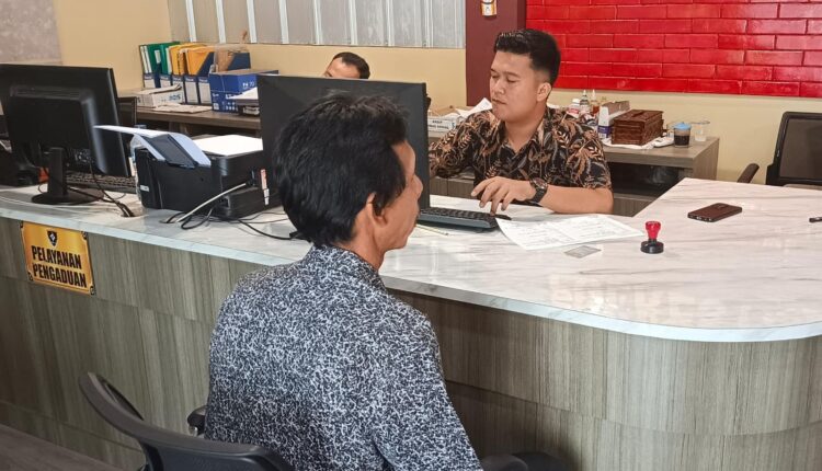 Lukman membuat Laporan Polisi.