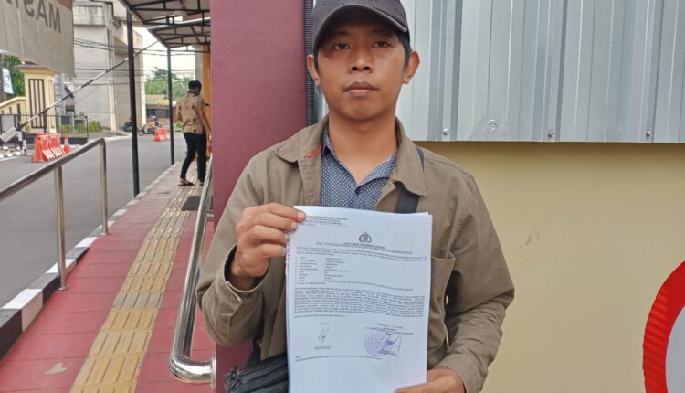 Korban usai membuat Laporan Polisi.