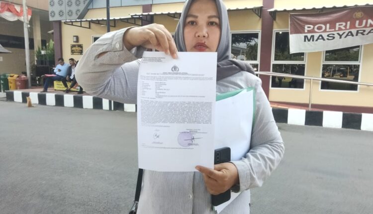 Korban usai membuat Laporan Polisi.
