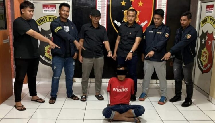 Tersangka saat diamankan.