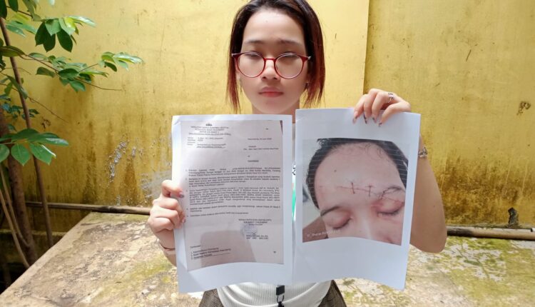 Korban saat mendatangi polrestabes Palembang usai operasi.