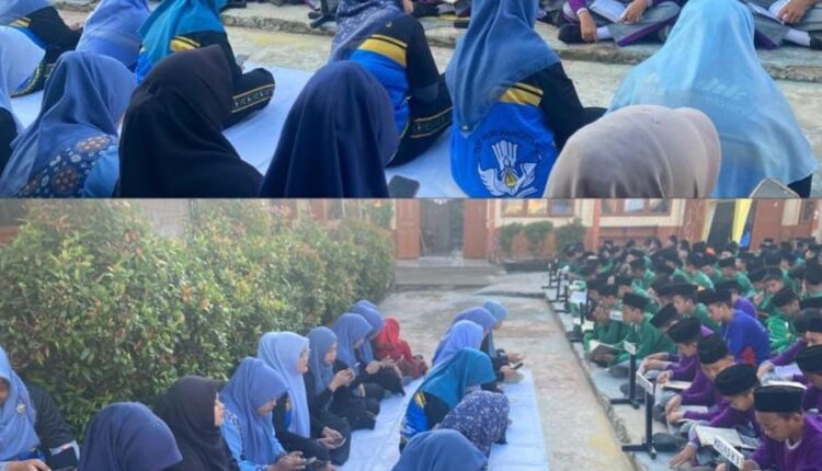 Siswa,guru dan Kepala SMP Negeri 30 Palembang mengelar Yasin bersama, sekaligus mendengarkan tausiyah dan himbauan yang disampaikan Kepala SMP Negeri 30 Palembang, Kamila Delima.