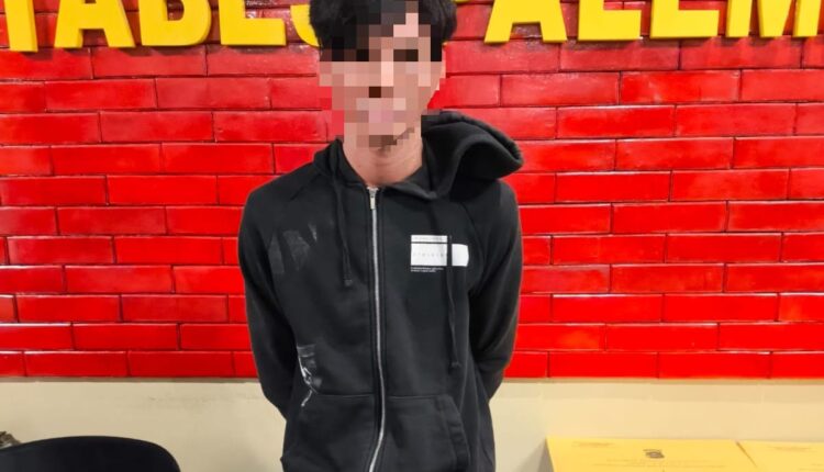 Pelaku saat diamankan di Kantor Polisi.