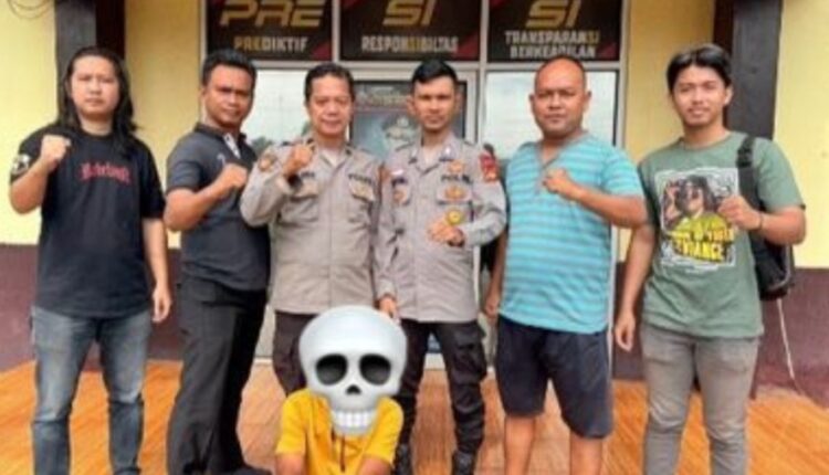 Pelaku saat diamankan di Polsek Tanjung Raja. (Foto: Dokumen Polisi)